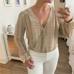 Cheetah print long sleeve cross front top